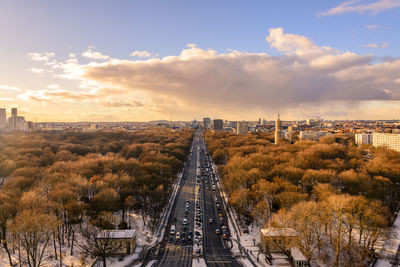 Aerial panoramic view, cityscape of berlin in winter season at tiergarten park during sunset.