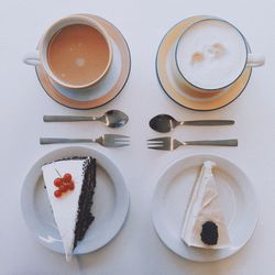 High angle view of coffee served on table