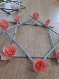 High angle view of red roses on table