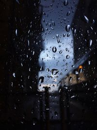 Close-up of water drops on glass