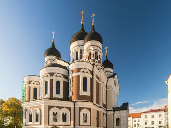 Low angle view of building against blue sky