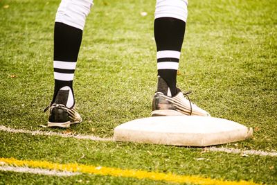 Low section of person on soccer field