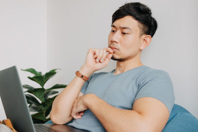 Young man using mobile phone