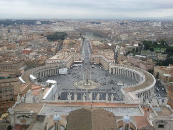 Aerial view of st peters square against cloudy sky