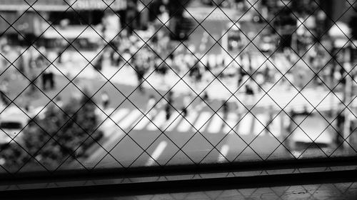 Chainlink fence seen through chainlink fence