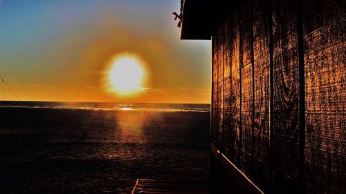 Scenic view of sea at sunset