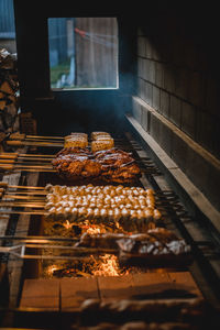 High angle view of meat on barbecue grill