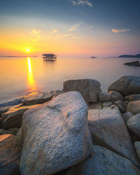Scenic view of sea against sky during sunset