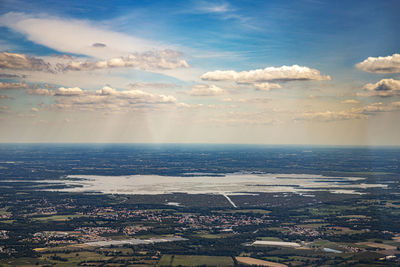 Aerial view of townscape against sky