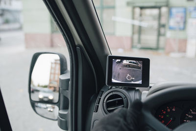 Close-up of monitor on dashboard in delivery van