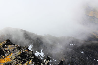 Mountain landscape in georgia, clouds, rocks, stones and alpine hiking