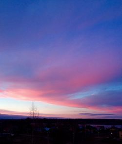 Silhouette landscape against sky during sunset