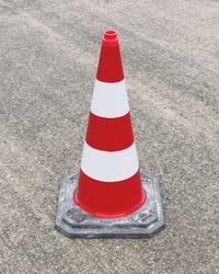 High angle view of red umbrella on road