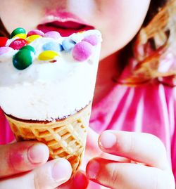 Cropped image of hand holding ice cream