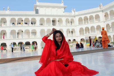 Woman with red umbrella