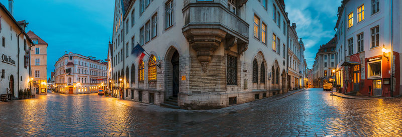 Canal amidst buildings in city