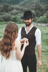 Young couple standing outdoors