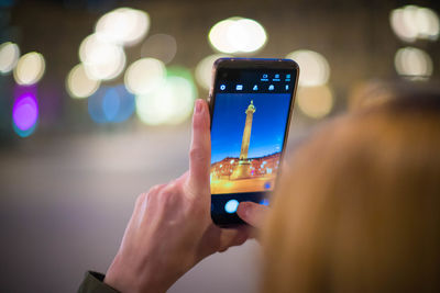 Close-up of hand holding smart phone