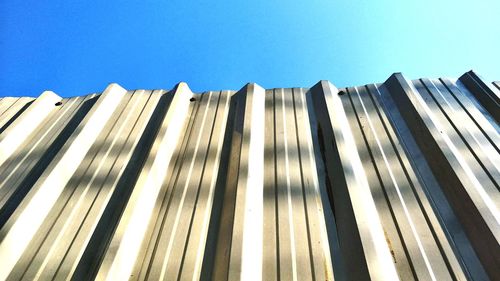 Low angle view of building against blue sky