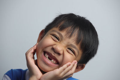 Close-up portrait of a smiling boy