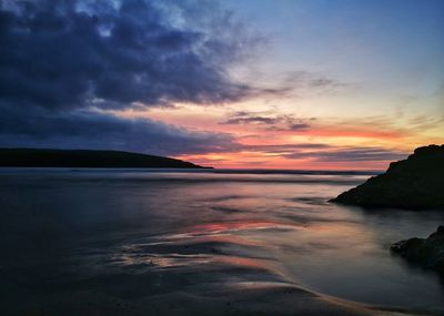 Scenic view of sea against sky at sunset