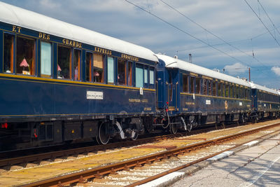 Train on railroad station platform against sky