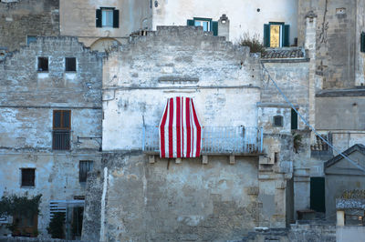 Red flag against buildings in city