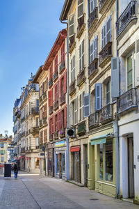 Street with historical houses in bayonne city center, france