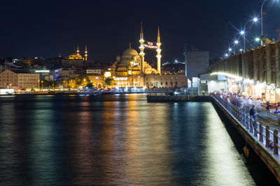 Illuminated buildings at waterfront