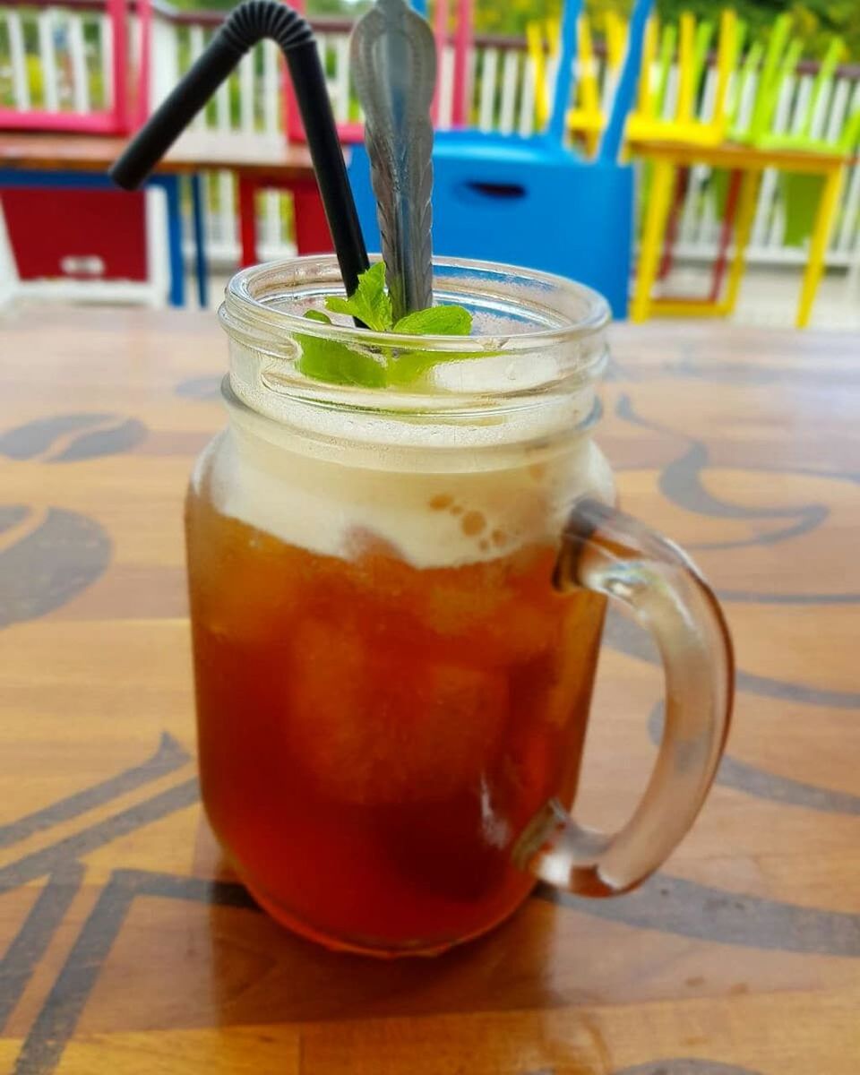 food and drink, drink, table, refreshment, straw, drinking straw, food, glass, focus on foreground, freshness, close-up, drinking glass, no people, household equipment, still life, indoors, cup, healthy eating, wood - material, wellbeing, temptation