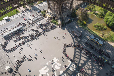 High angle view of people below eiffel tower