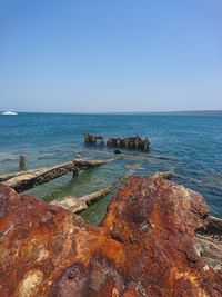 Scenic view of sea against clear sky