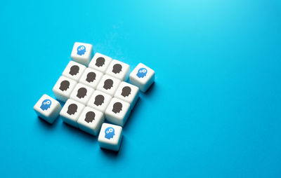 Close-up of dices on blue background