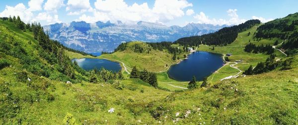 Panoramic view of landscape and mountains against sky