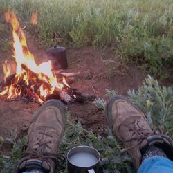 Low section of bonfire on landscape