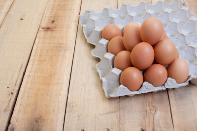 High angle view of eggs in container
