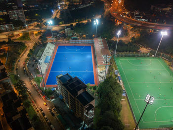 High angle view of illuminated city buildings