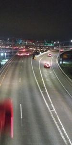 High angle view of light trails on road at night