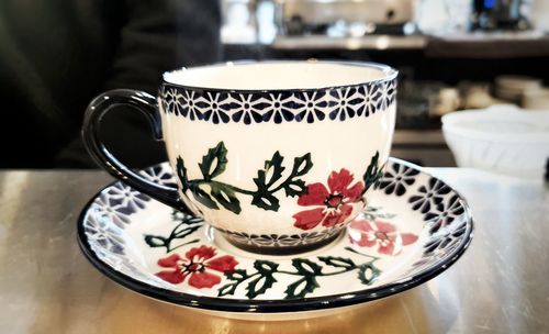 Close-up of tea cup on table