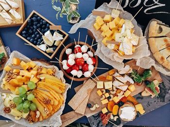 High angle view of chopped fruits on table