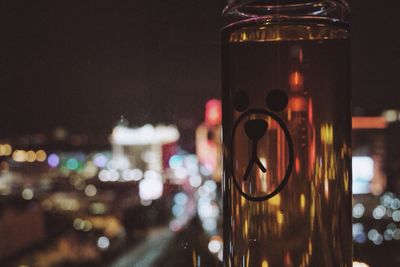 Close-up of illuminated lights at night