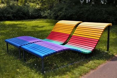 Empty chairs in park