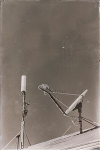 Crane against clear sky during winter