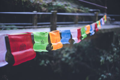 Nepal trekking in the himalayas from pokhara, with fluttering prayer flags in the mountains.