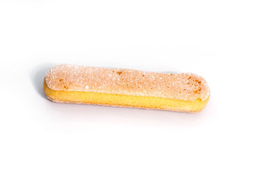 Close-up of bread over white background