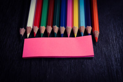 High angle view of multi colored pencils on table