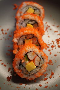 Close-up of sushi served in plate