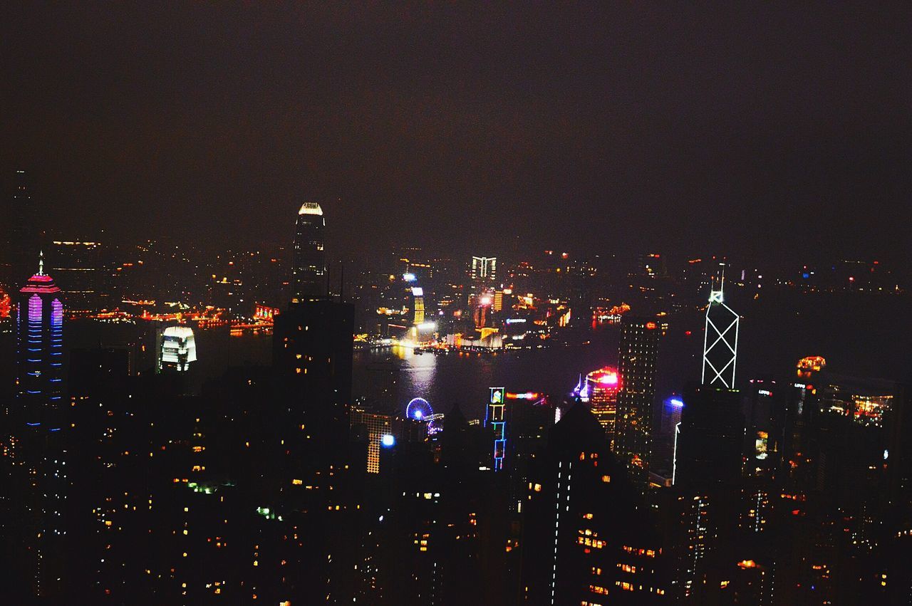 city, cityscape, illuminated, transportation, night, building exterior, outdoors, urban skyline, sky, business finance and industry, architecture, large group of people, skyscraper, people, drone