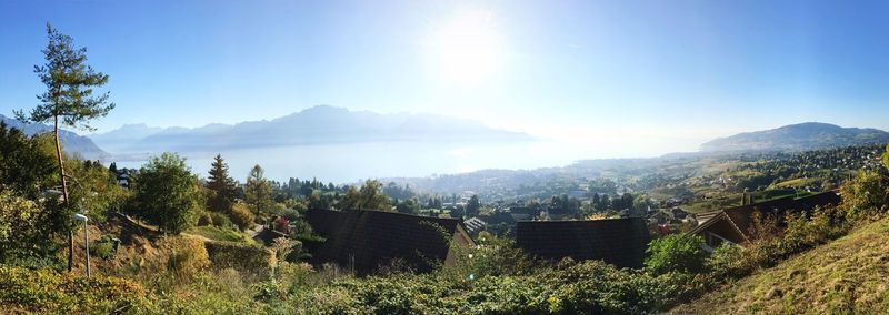 Panoramic view of landscape against sky on sunny day