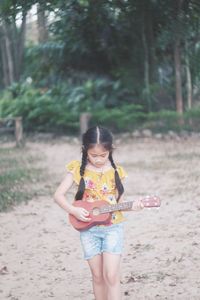 Portrait of girl playing